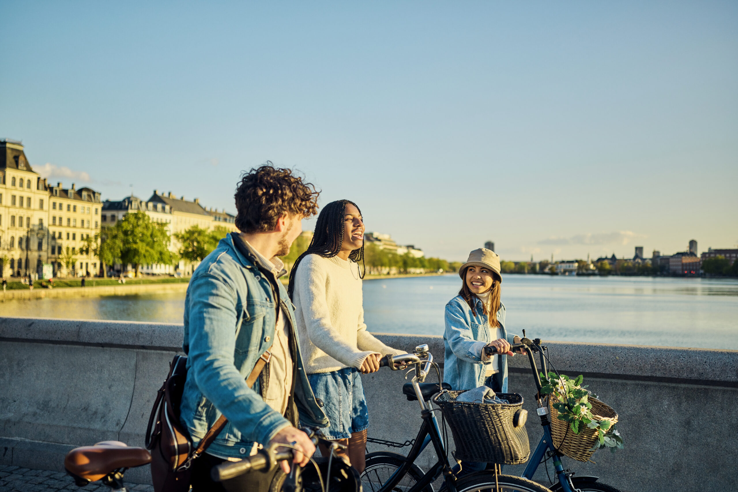 Cityscape Connection: Multi-Ethnic Friends Create Memorable Moments through Cycling