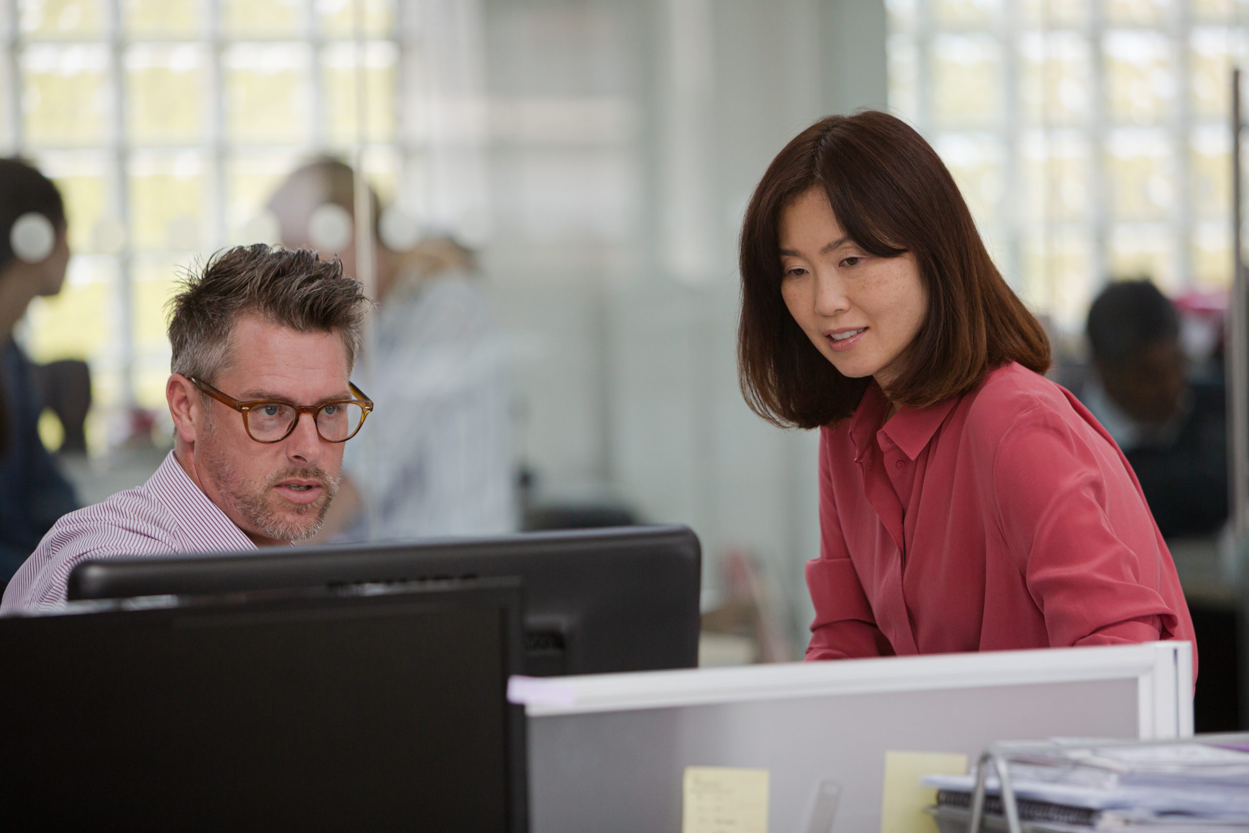 Business people working at computer in office